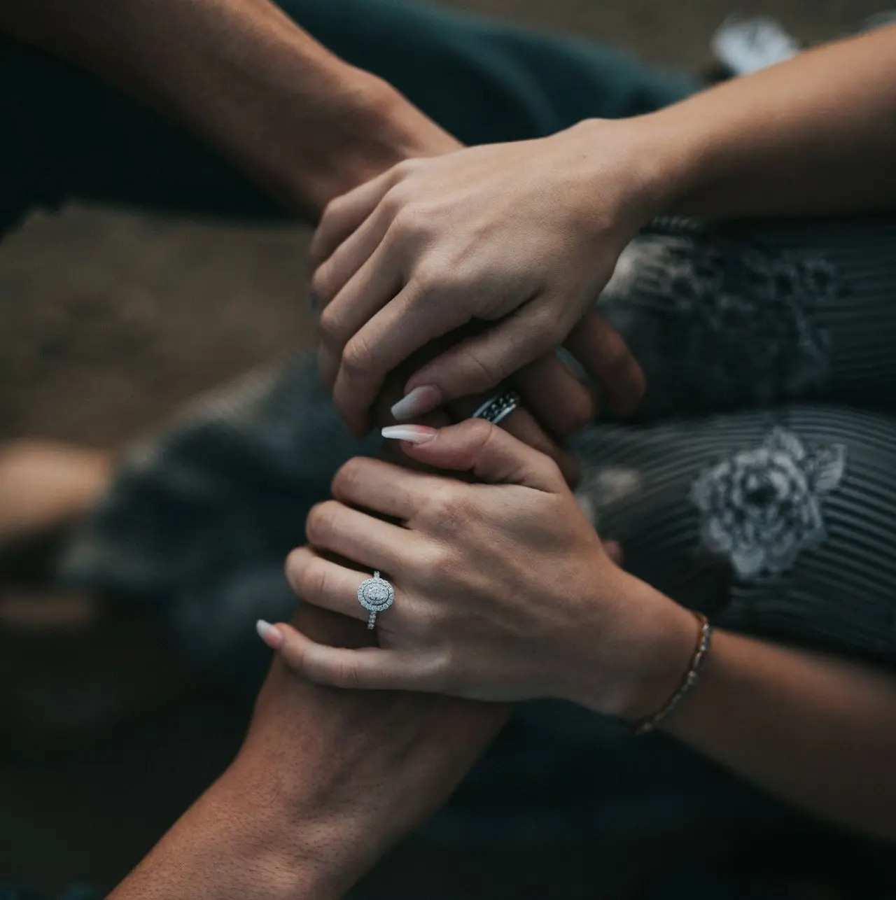 man and woman holding each others hands